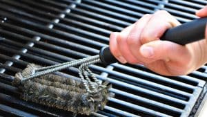 Not cleaning the grill frequently enough or removing food residue properly