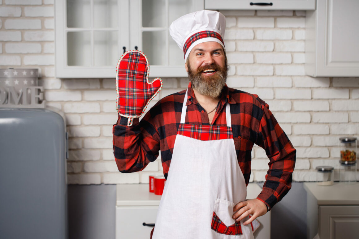 Famous chef of a home restaurant prepares dishes.